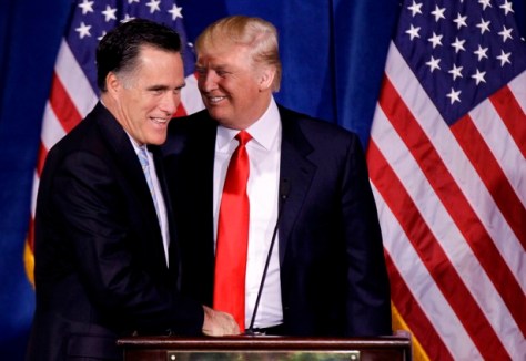 Donald Trump greets Republican presidential candidate, former Massachusetts Gov. Mitt Romney, after announcing his endorsement of Romney during a news conference, Thursday, Feb. 2, 2012, in Las Vegas. (AP Photo/Julie Jacobson)