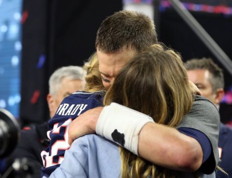 New England Patriot QB after record breaking fifth Super Bowl win with wife and daughter {photo: AP}