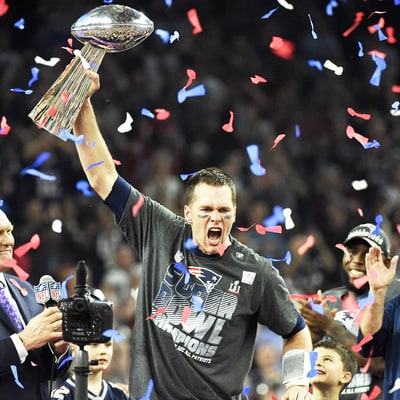 New England Patriot QB Tom Brady with Super Bowl trophy 2017 (Photo: U.S. Weekly}